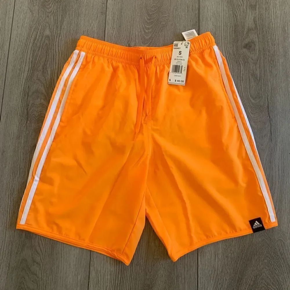 Adidas men 3Ssize S men swim shorts. Color orange/ rush white